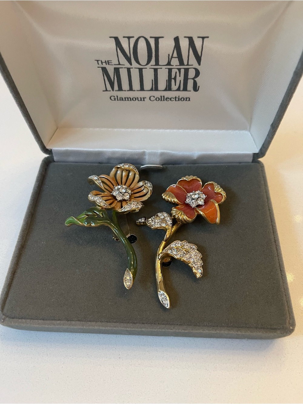 Nolan Miller Orange & Green Enamel Floral Crystal Brooch Pair